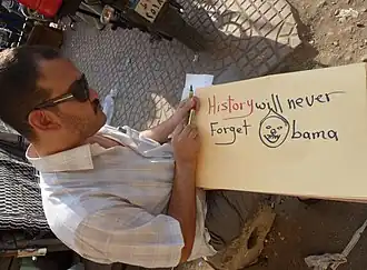 Dank an die USA: „Die Geschichte wird Obama nie vergessen“.[218]