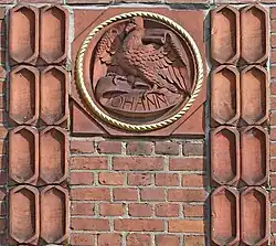 Medaillon des Evangelisten Johannes und konkave Formsteine