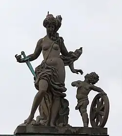 55. Justitia (Gerechtigkeit) – Putto, Richtschwert, Richtrad.[37]