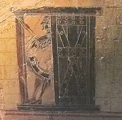 12. Stadttor von Troja, Holztor mit überstehenden oberen und unteren Ohren, Françoisvase, 570 vor Christus.