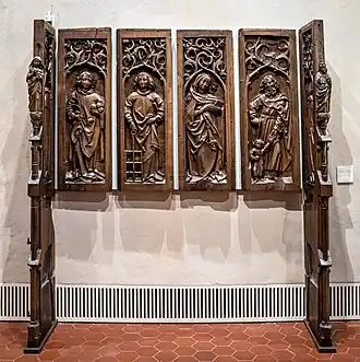 Martyrium des Heiligen Laurentius, geschnitzte Fragmente des Chorgestühls, Eiche, 1493, Antoniter­komturei von Isenheim