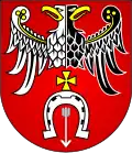 Das Wappen des Powiat Brzeziński zeigt zwei halbe Adler und keinen Doppeladler
