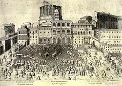 Kupferstich von einer riesigen Menschenmenge auf dem Petersplatz mit dem teilweise erbauten Petersdom. Im Vordergrund sind viele Menschen und einige Pferdekutschen an den vorderen Häuserfronten zu einer dunklen Masse zusammengepfercht. Im Hintergrund sind Häuserfassaden mit Menschen auf Balkonen und einem Tordurchgang zu sehen. Der Petersdom ragt ohne Kuppel über die Häuser und hat an seiner Spitze eine Baukonstruktion.