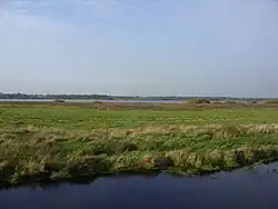 Blick über den Polder Glies zum Sellstedter See