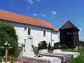 Römisch-katholische Kirche Szentlélek mit hölzernem Glockenturm