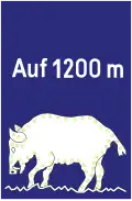 Warntafel „Wildwechsel durch Wild­schweine“.