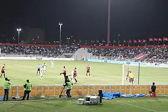 Das al-Rashid Stadium im Januar 2012 beim Spiel AC Mailand gegen Paris Saint-Germain