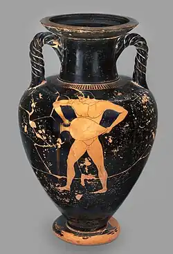 nackter Mann gießt aus Amphora Wein aus