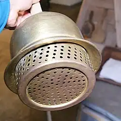 Wäsche­stampfer, Sieb­träger