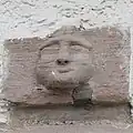 Kopfskulptur sekundär vermauert