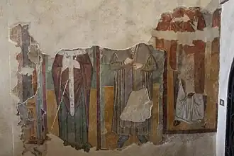 Fresko der drei Heiligen im nördlichen Seitenschiff