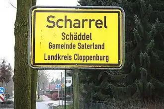 Deutsch-saterfriesische Ortstafel in Scharrel, Gemeinde Saterland