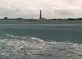 Blick über die Nordsee auf Schiermonnikoog mit den zwei Leuchttürmen (Februar 2004)