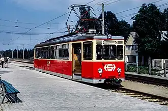 St&H ET 20.110 im Bahnhof Bürmoos als Zug 723, 1983