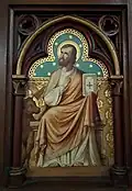 Darstellung des Evangelisten Lukas auf der Kanzel
