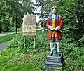 Statue Doktor Eisenbart mit Hinweisschild Hann. Münden, Einfahrt von der Wilhelmshäuser Straße