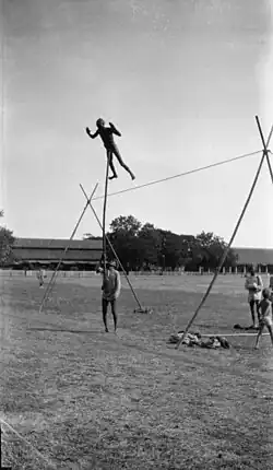 Indian man holding his companion up …