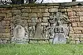Ensemble von drei fragmentarischen barocken Grabdenkmälern in der Kirchhofsmauer