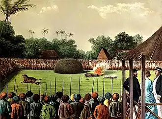 Das Erstechen von Tigern im Schauspiel Rampok am Hof des Susuhunans von Surakarta (Java). – Lithographie von Jhr. J. C. Rappard. In: Het Kamerlid van Berkenstein in Nederlandsch-Indië. Von M. T. H. Perelaer. Leiden, A. W. Sijthoff, 1888.[100]