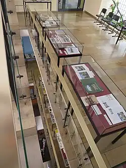 Ausstellung: 40 Jahre Wernersche Verlagsgesellschaft in der Stadtbibliothek Worms und zugehöriges Plakat