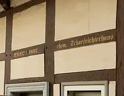 Balkeninschrift zum Alter und zur Funktion