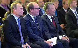 Joël Bouzou (rechts) mit Wladimir Putin und Prinz Albert II. beim World Olympians Forum 2015 in Moskau