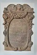 Wandrelief zu Ehren eines Pfarrers aus dem 17. Jahrhundert (1687)