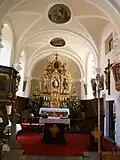 Kircheninneres mit dem Altar des Hl. Wolfgang