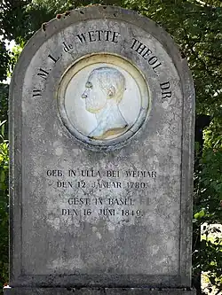 Wilhelm Martin Leberecht de Wette, 1780–1849, Friedhof Wolfgottesacker, Basel. Grabmalmedaillon von Heinrich Rudolf Meili (1827–1882)