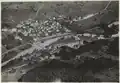 Historisches Luftbild mit Seidendruckerei Mitlödi AG von Walter Mittelholzer zwischen 1918 und 1937