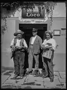 Loco TI, Pöstler und zwei ältere Männer am Strohflechten (1933)